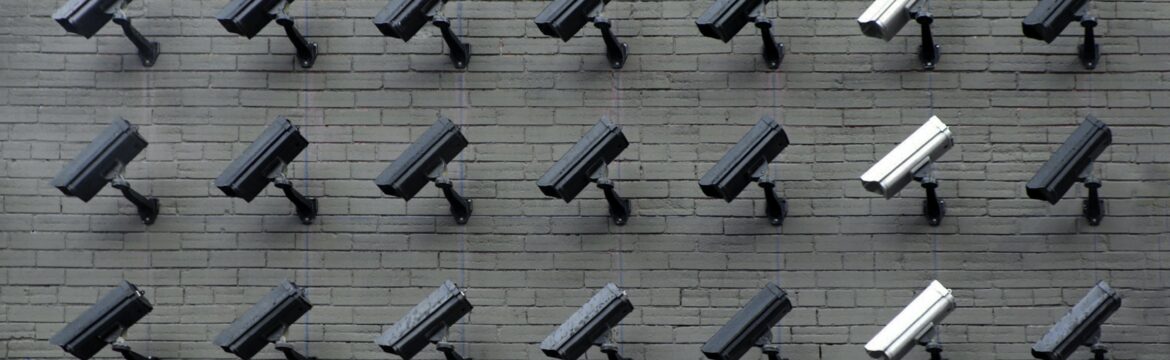 A wall featuring multiple CCTV cameras